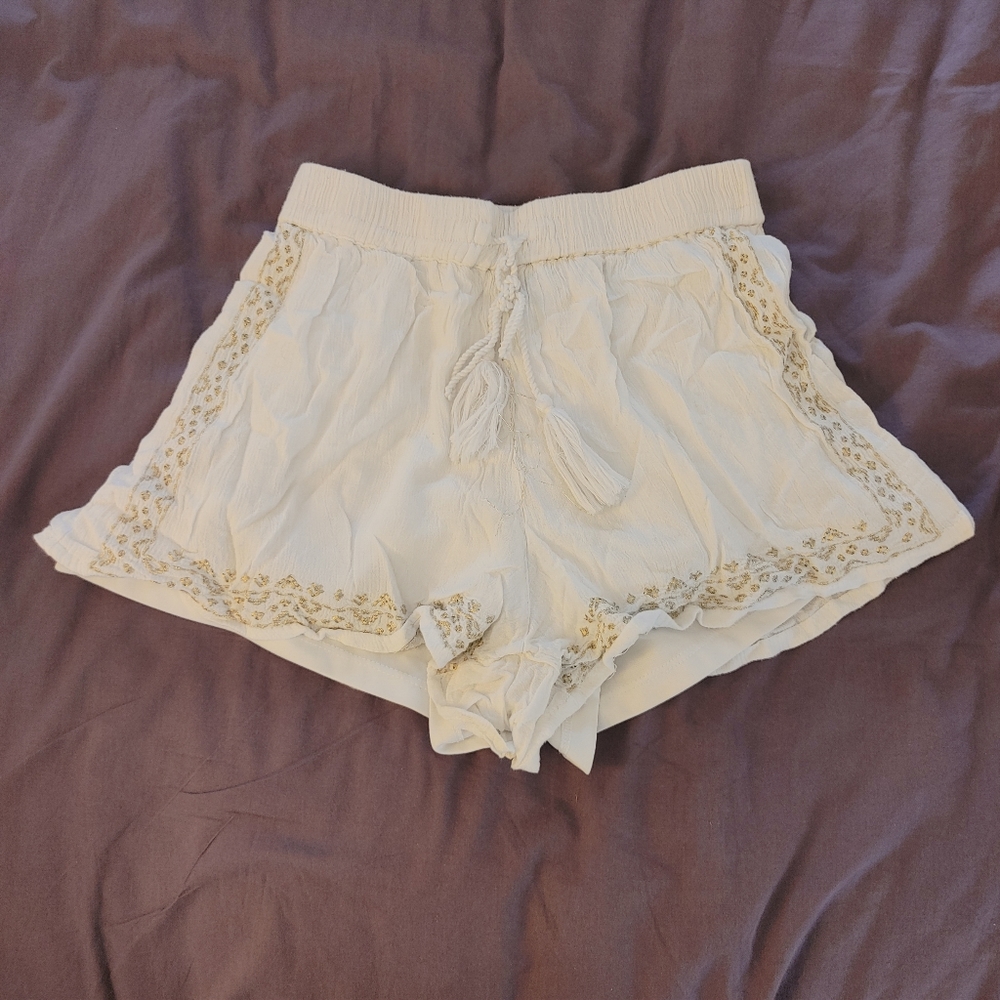 Atmosphere white and gold shorts size 6 US